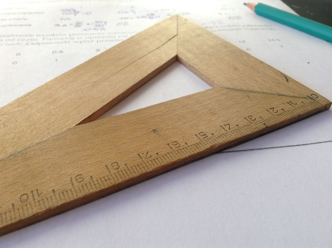 Wooden Triangle Ruler and Pencil on Math Worksheet - Free Images, Stock Photos and Pictures on Pikwizard.com