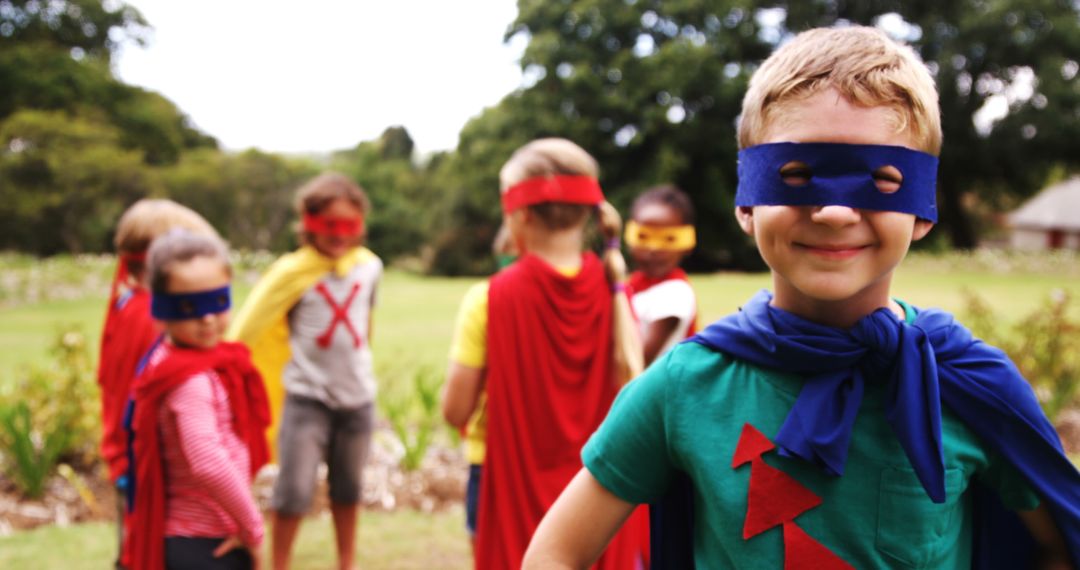 Group of Kids Playing in Superhero Costumes in Park - Free Images, Stock Photos and Pictures on Pikwizard.com