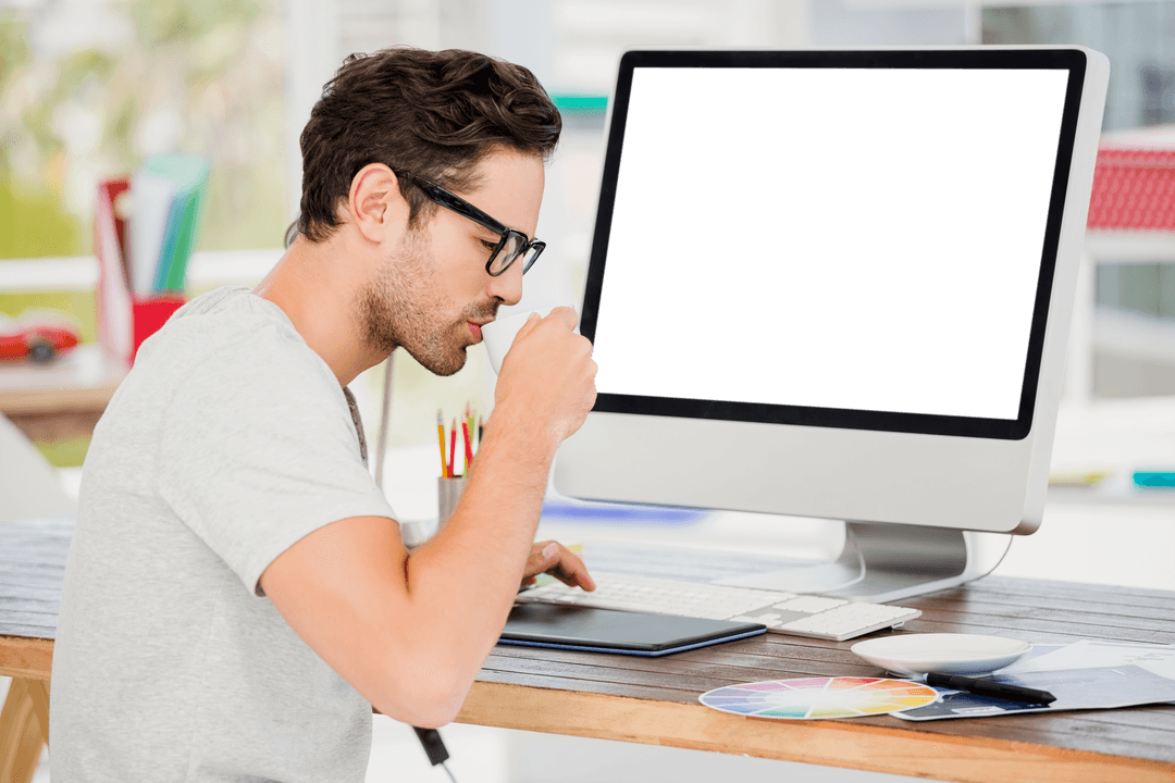 Transparent Eyewear Man Drinking Coffee at Work Desk