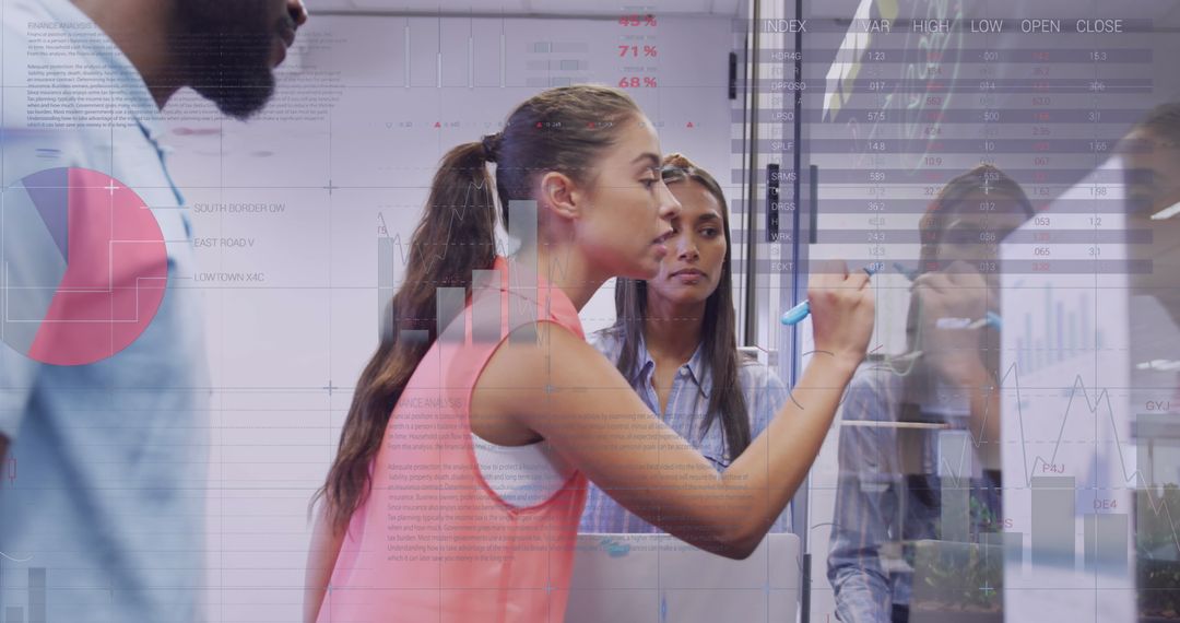 Innovative Business Team Analyzing Data on Transparent Board