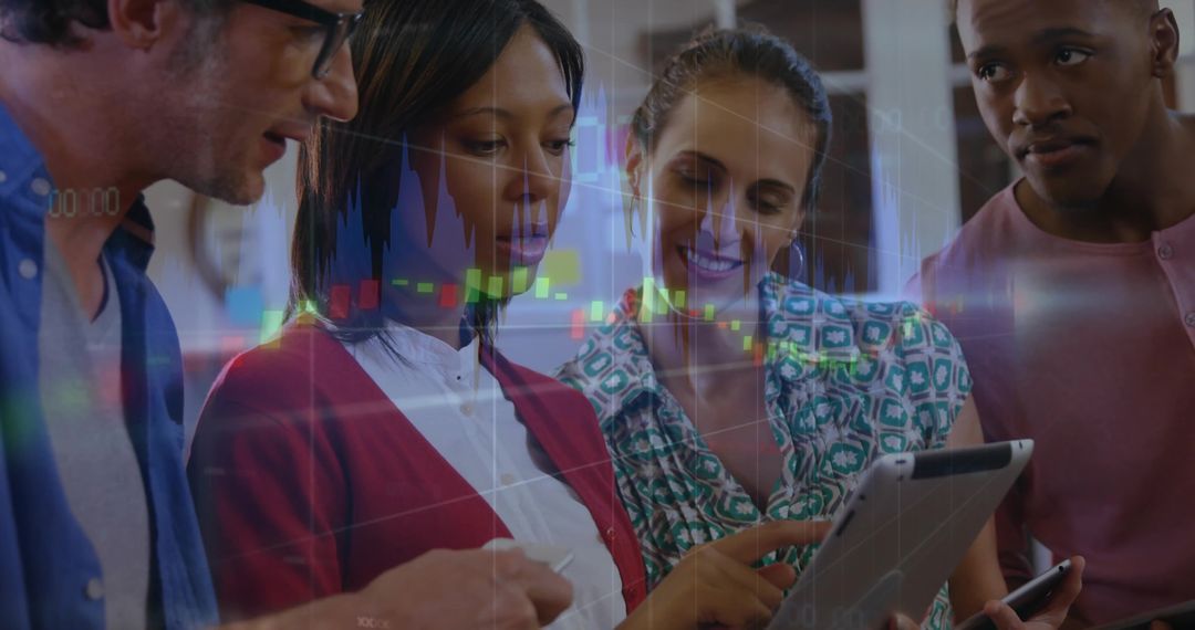 Diverse Team Analyzing Financial Data on Digital Devices in Office