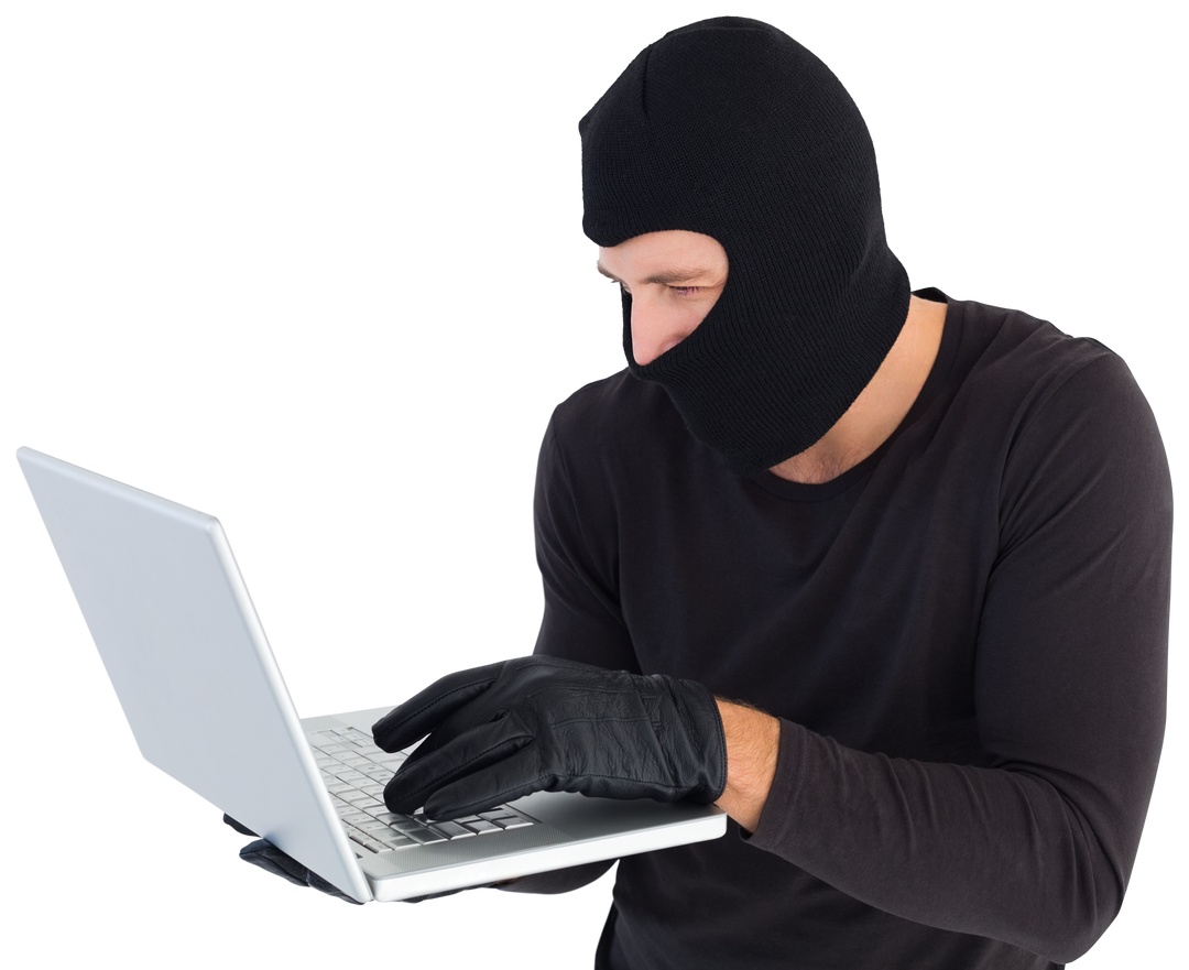 Transparent masked burglar focused using laptop hacking data - Download Free Stock Images Pikwizard.com