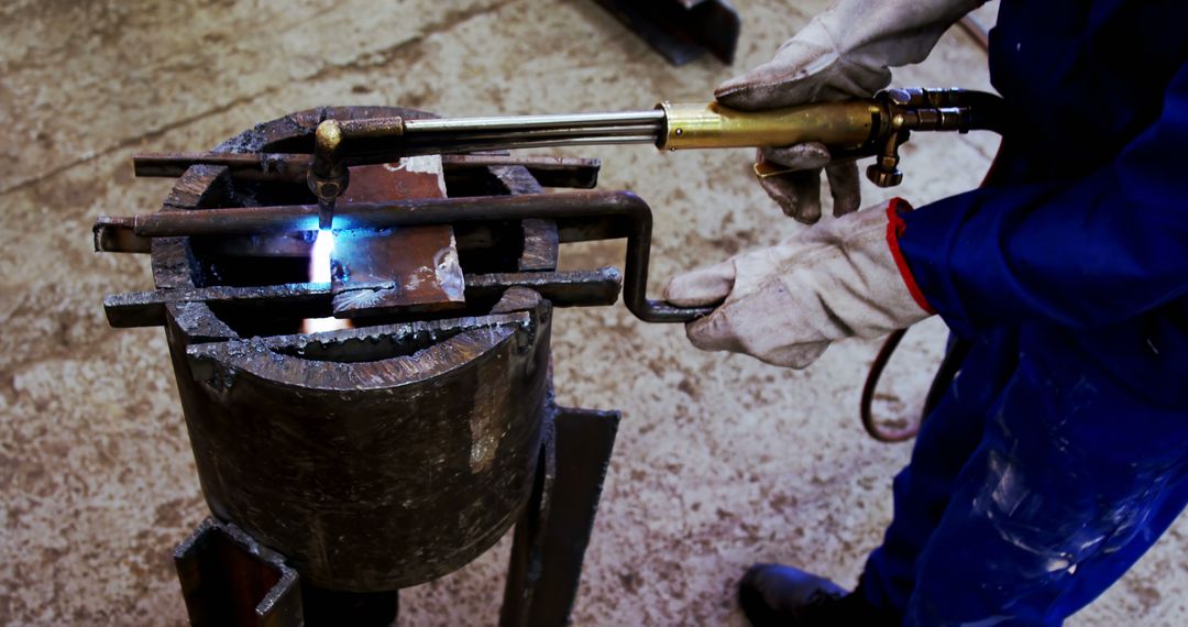 Welder Cutting Metal with Torch in Workshop - Free Images, Stock Photos and Pictures on Pikwizard.com