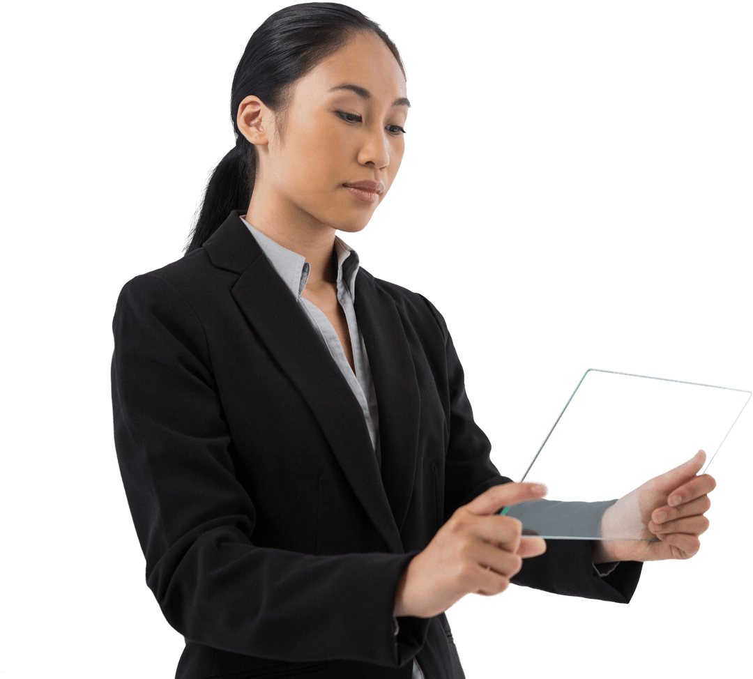 Focused Businesswoman Using Transparent Glass Tablet