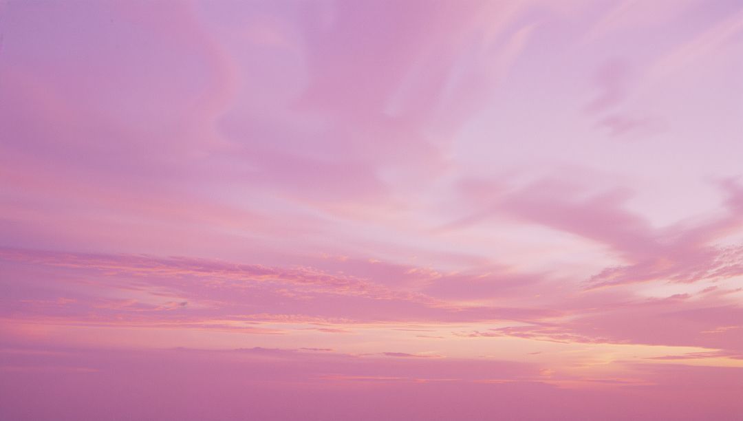 Pink Dusk Sky with Featherlike Clouds and Soft Gradients