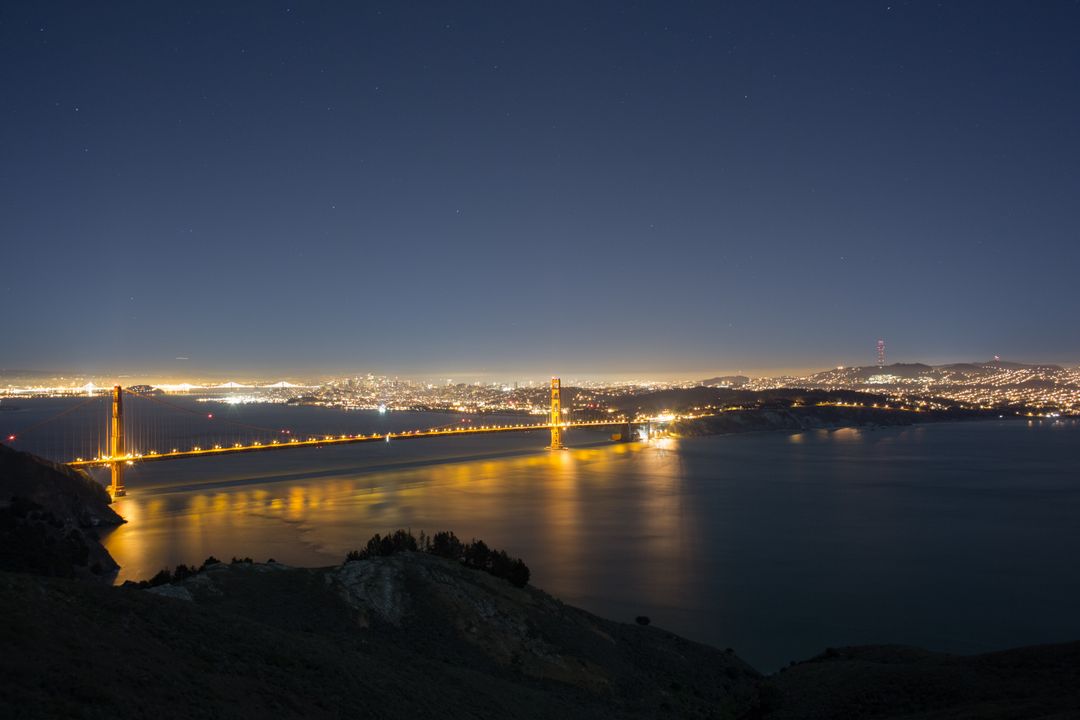 Golden Gate Bridge Illuminated at Night with City Skyline - Free Images, Stock Photos and Pictures on Pikwizard.com