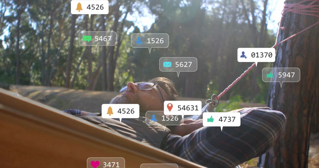 Man Relaxing in Forest Hammock with Social Media Notifications