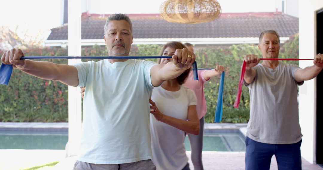 Yoga Stretch Routine Using Resistance Bands on Sunny Patio