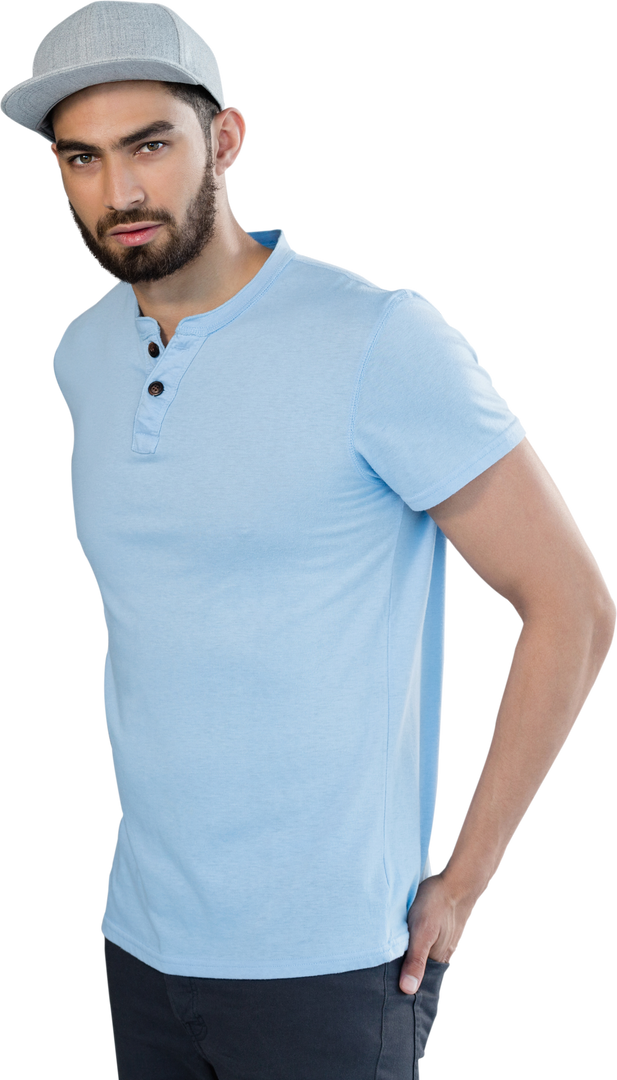 Stylish Man Posing with Hands in Pocket, Wearing Light Blue T-shirt - Download Free Stock Images Pikwizard.com