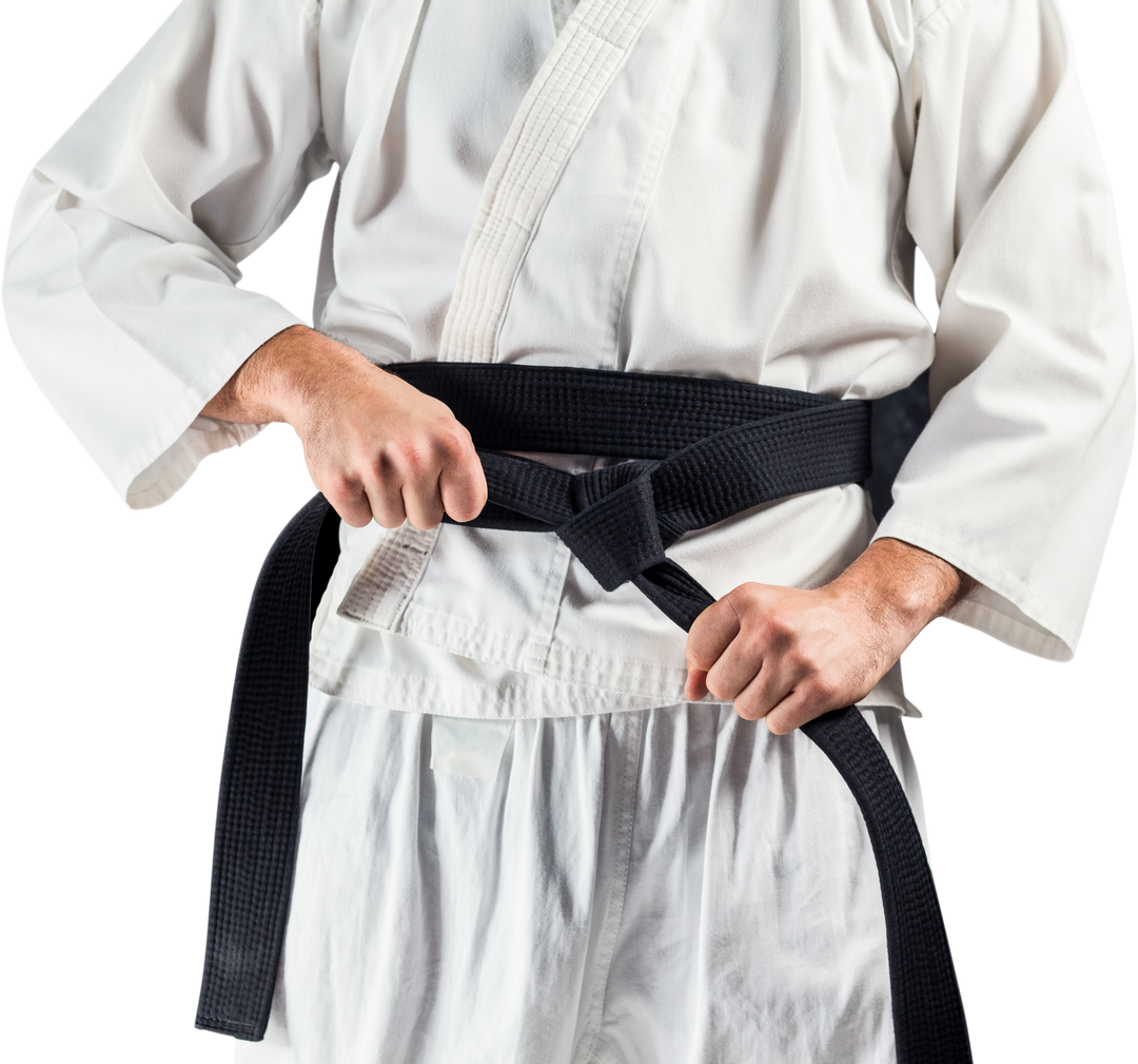 Karate Fighter Tightening Black Belt on Karate Gi - Download Free Stock Images Pikwizard.com