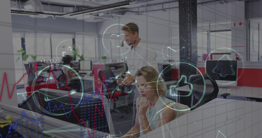 Innovative Team Analyzing Financial Data with Digital Interface in Modern Office