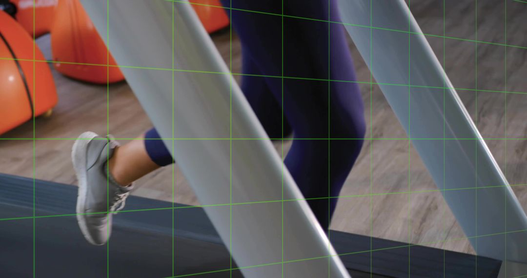 Focused Woman Running on Treadmill in Modern Fitness Center