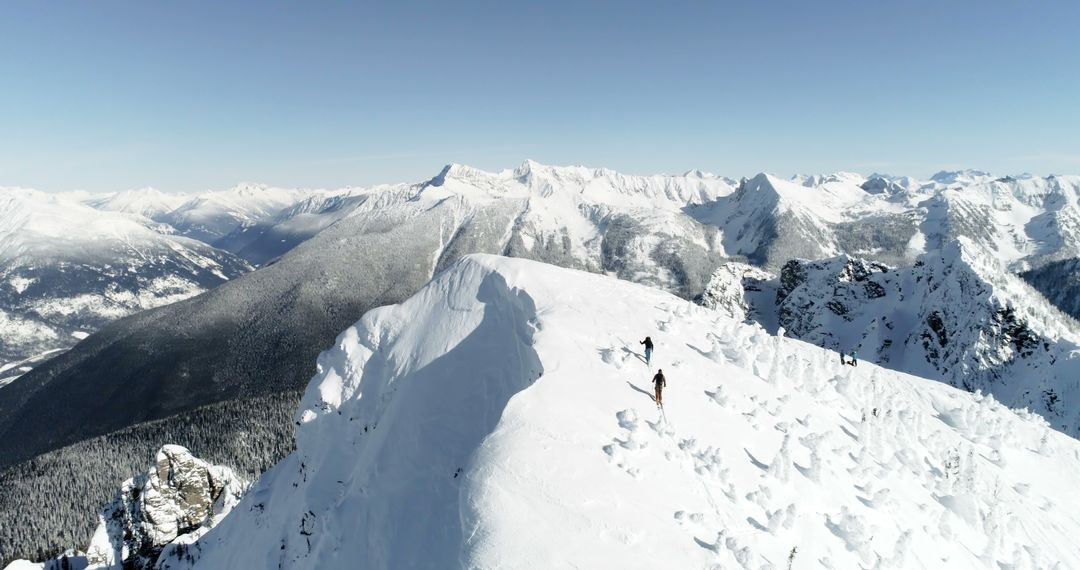 Intrepid Adventurer Exploring Snowy Mountain Ridge
