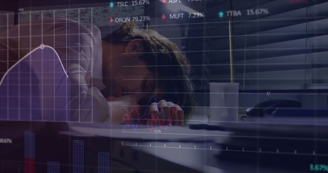 Overworked Businessman Surrounded by Digital Financial Data Graphics