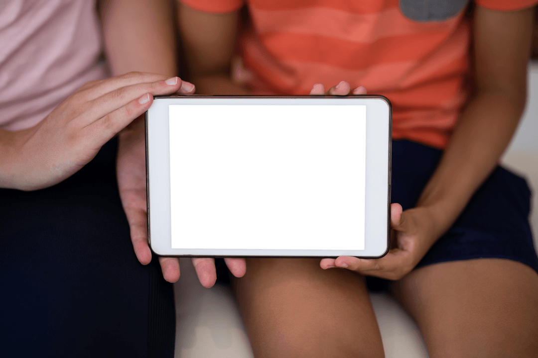 Midsection View of Kids Holding Transparent Tablet Blank Screen