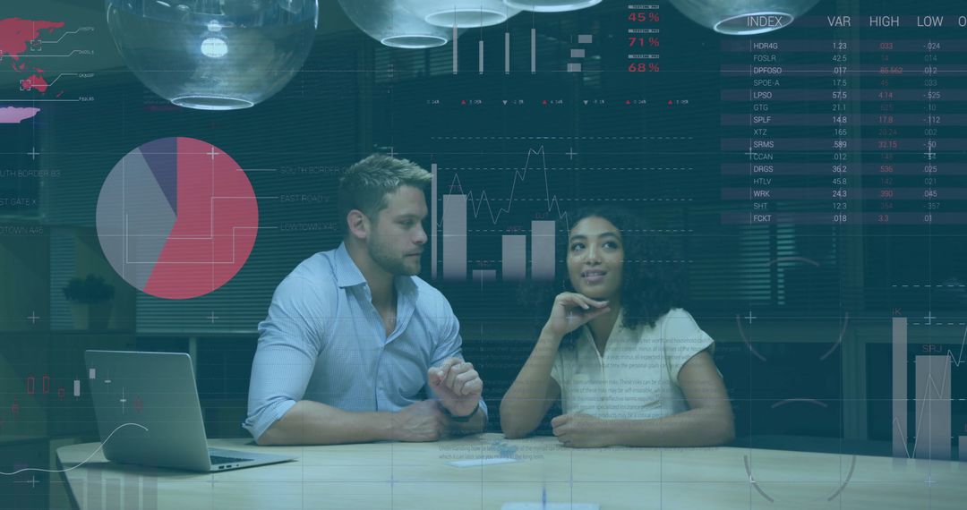 Diverse Professionals Analyzing Financial Data Visualization in Office