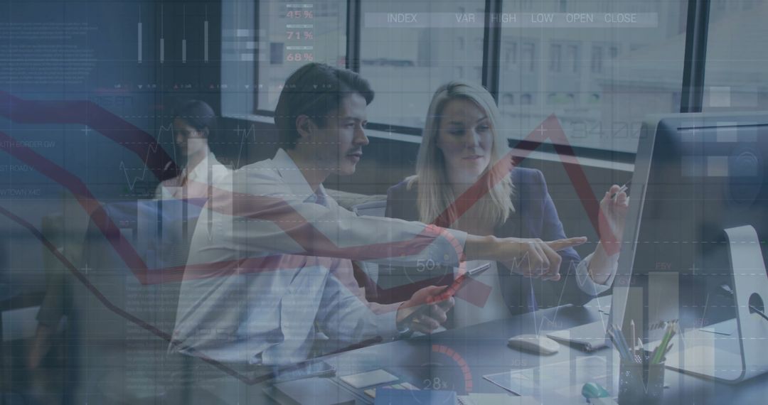 Financial Analysts Discussing Market Data on Computer Screens
