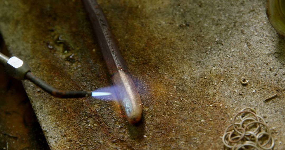 Close-Up of Welding Torch and Metal Tube in Workshop - Free Images, Stock Photos and Pictures on Pikwizard.com