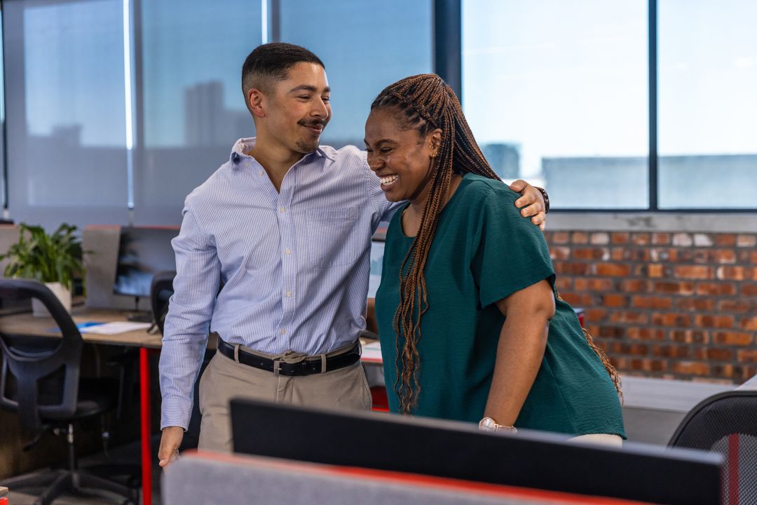 Colleagues Enjoying Teamwork in Modern Office Setting