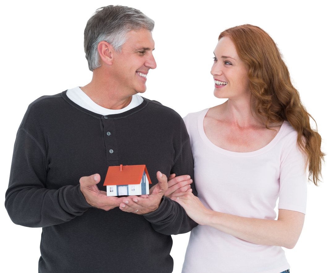 Casual Mature Couple Holding Model House on Isolated Background - Download Free Stock Images Pikwizard.com