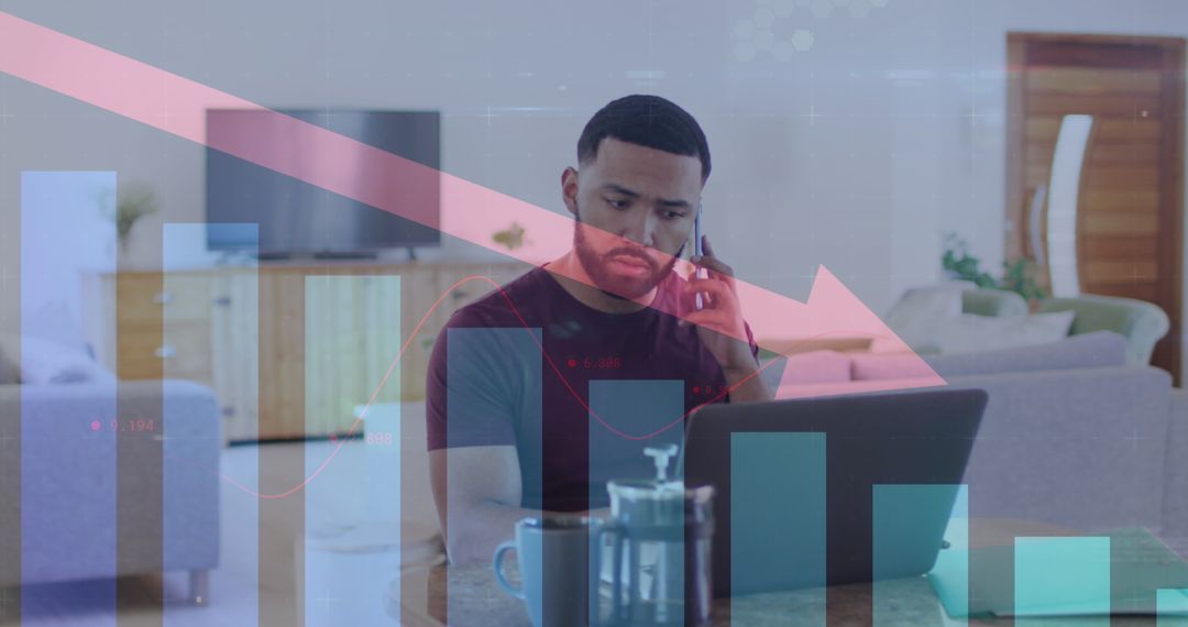 Businessman Analyzing Declining Data Trends on a Laptop