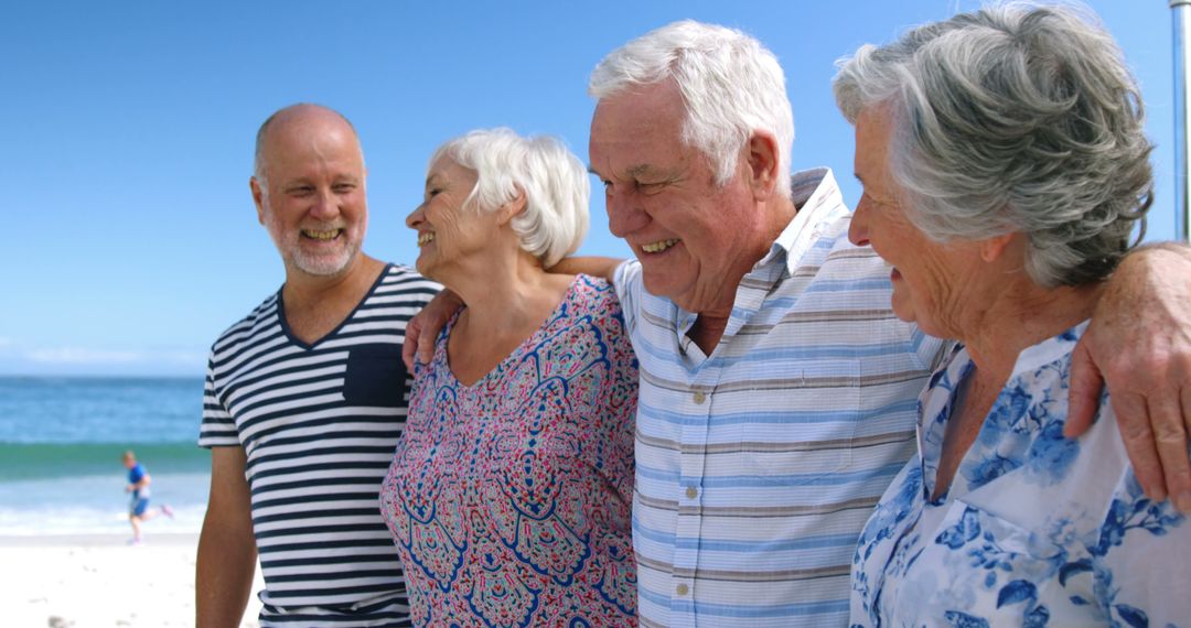 Happy Group of Senior Friends Enjoying Day at Beach - Free Images, Stock Photos and Pictures on Pikwizard.com