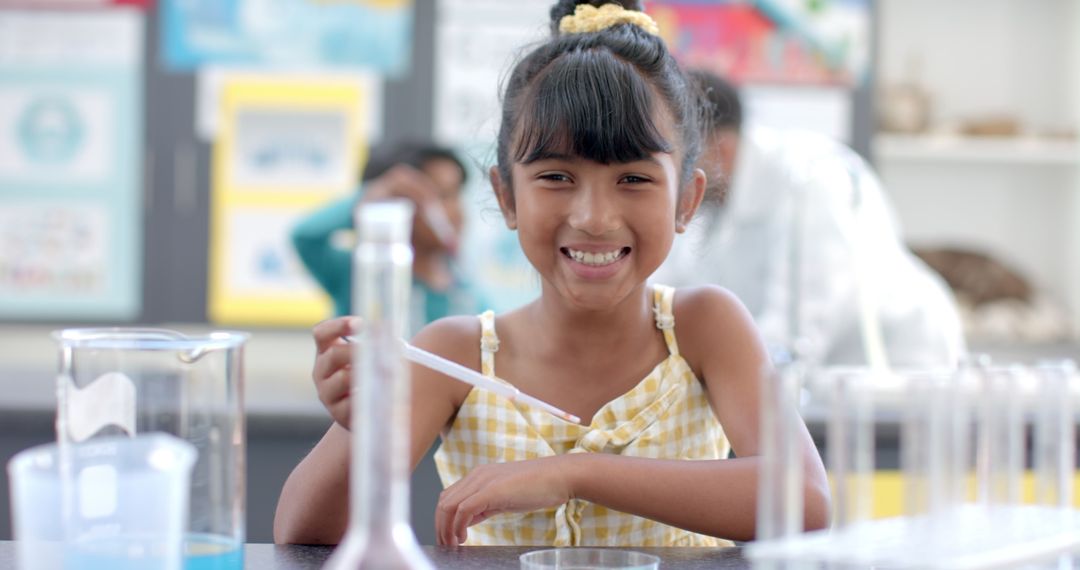 Young Student Smiling in Science Class Laboratory