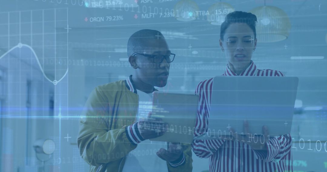 Business Professionals Analyzing Digital Stock Data in Office Setting