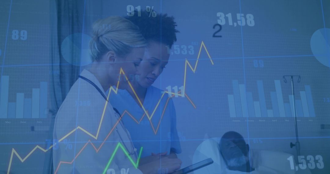 Doctor and Nurse Analyzing Data on Tablet with Overlaying Graphs