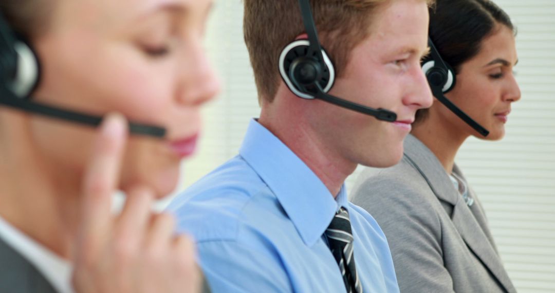 Customer Service Representatives Using Headsets in Professional Call Center - Free Images, Stock Photos and Pictures on Pikwizard.com