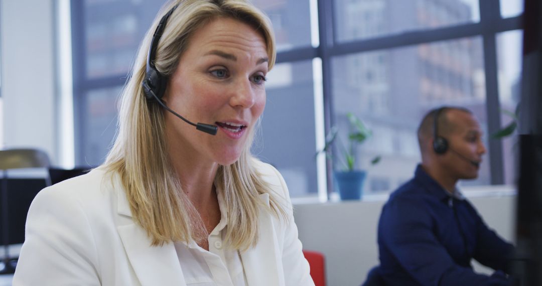 Customer Service Team Engaging with Clients in Modern Office