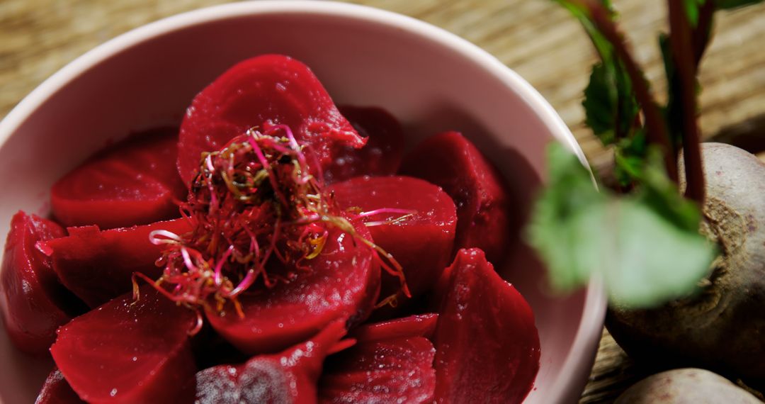 Close-Up of Freshly Cooked Beetroot Slices in Pink Bowl - Free Images, Stock Photos and Pictures on Pikwizard.com