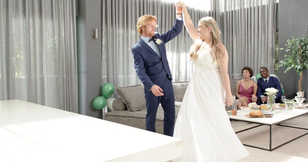 Bride and Groom Dancing with Guests Watching Reception Celebration