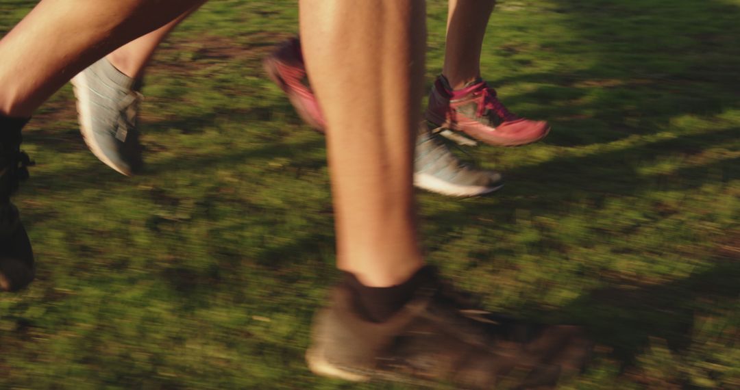 Close-Up Action of Running Shoes on Grass Field - Free Images, Stock Photos and Pictures on Pikwizard.com