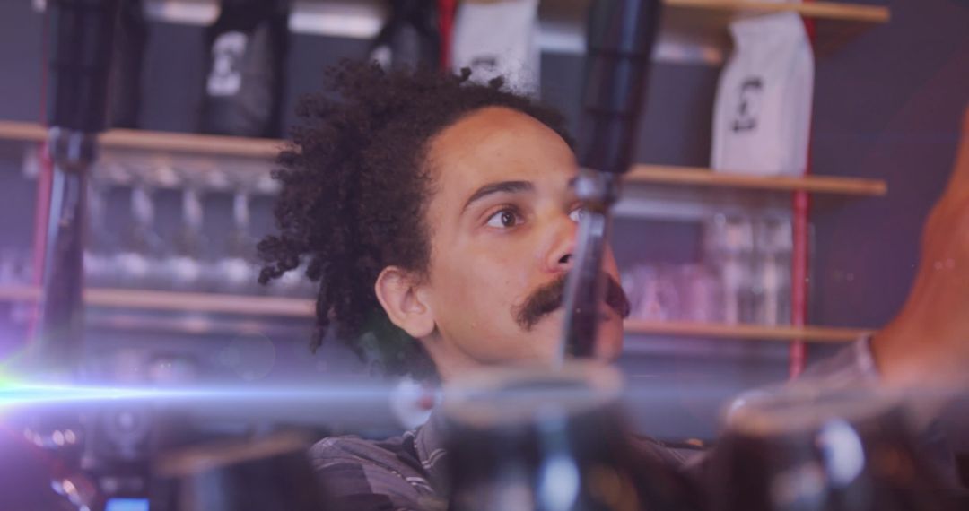 Barista Crafting Beverages in Busy Cafe Setting