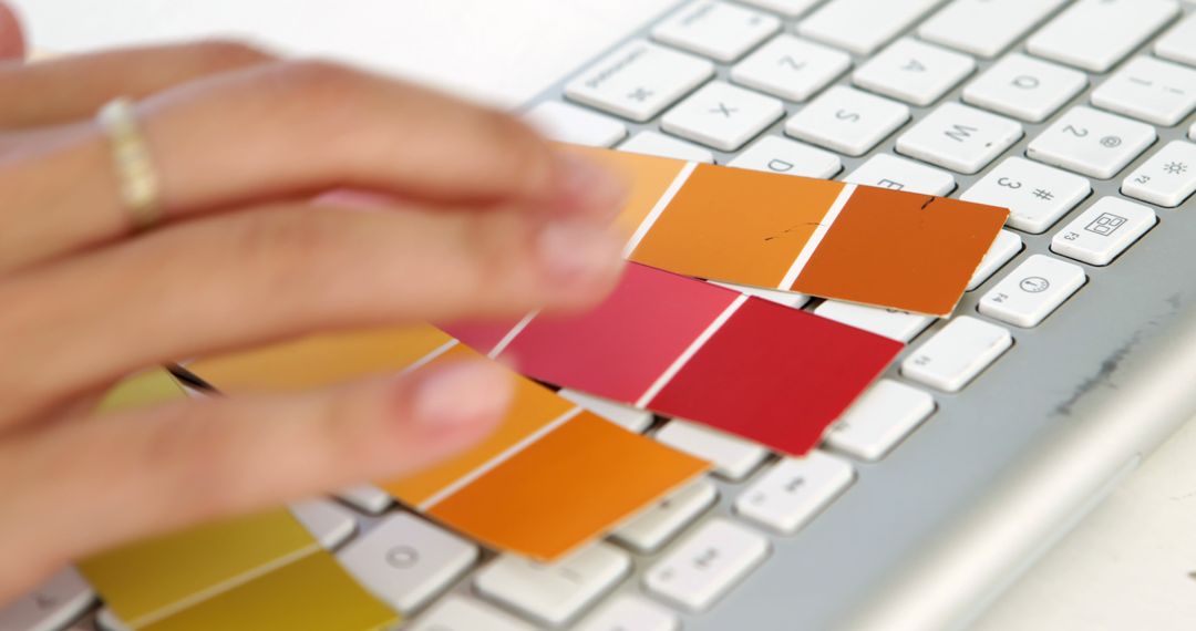 Designer Selecting Color Swatches on Keyboard - Free Images, Stock Photos and Pictures on Pikwizard.com