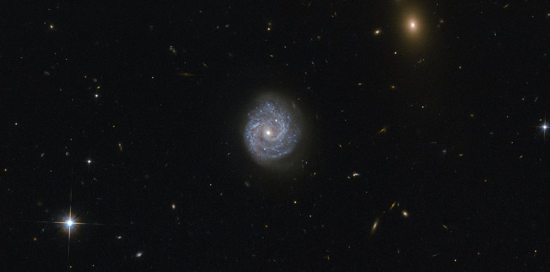Hubble Gazes Into a Black Hole of Puzzling Light - Free Images, Stock Photos and Pictures on Pikwizard.com