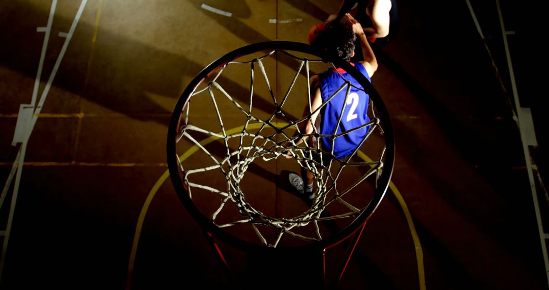 Aerial View of Basketball Player in Action on Court
