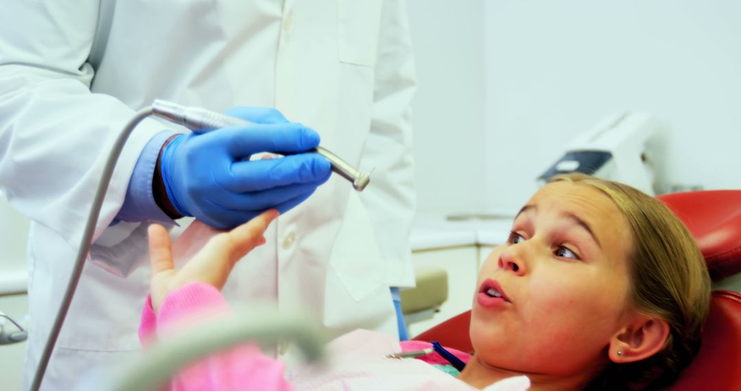 Young Girl Shocked at Dentist Office During Procedure - Free Images, Stock Photos and Pictures on Pikwizard.com