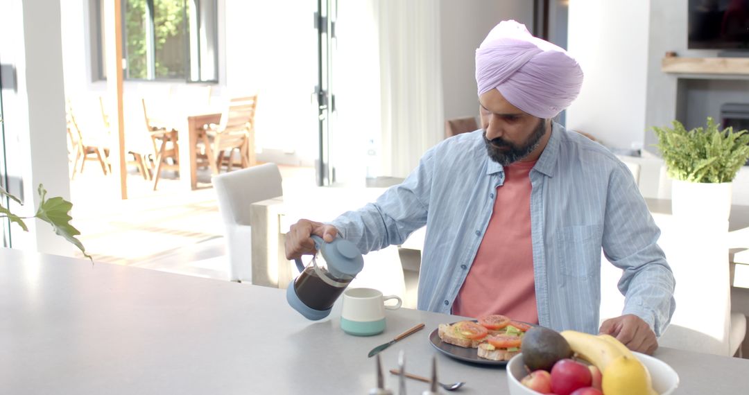 Man in Turban Enjoying Morning Coffee and Breakfast at Home
