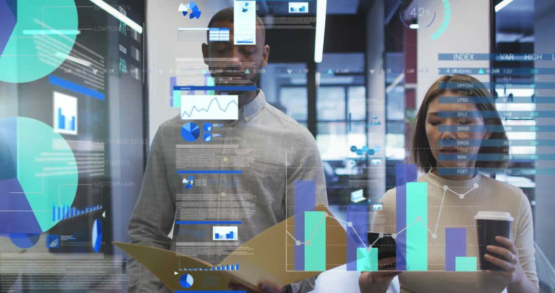 Diverse Colleagues Analyzing Data in Modern Office with Digital Interface