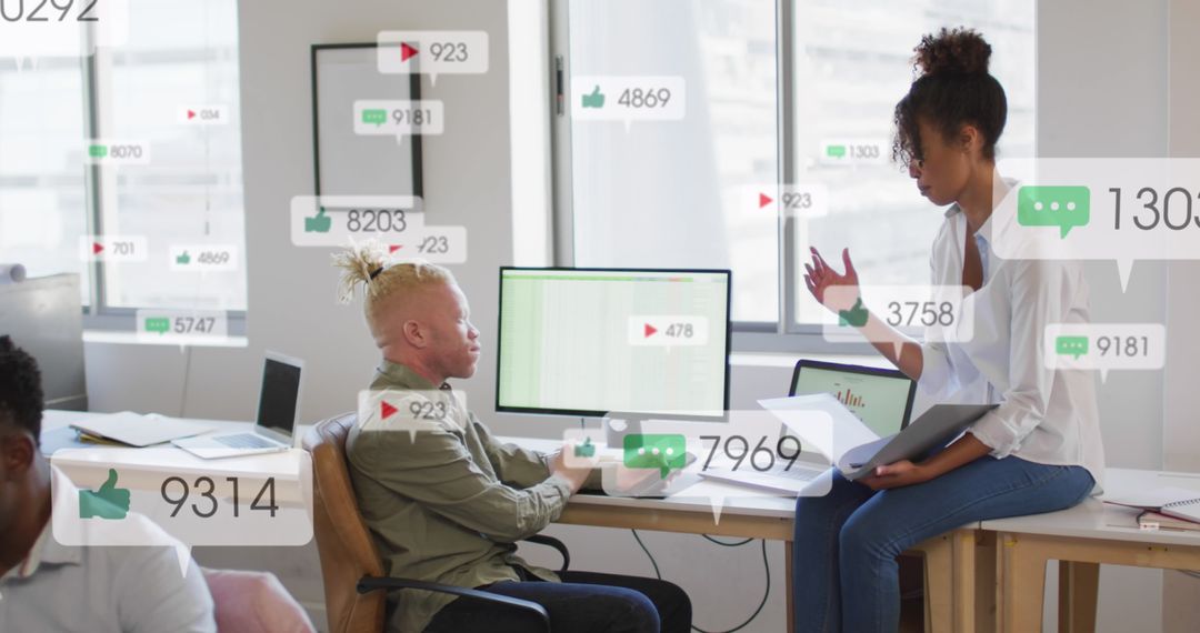 Diverse Coworkers Discussing Social Media Strategy with Notifications Overlaid