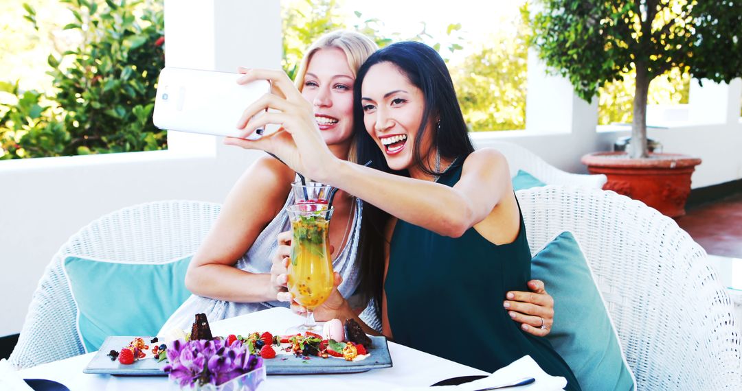 Friends Taking Selfie While Enjoying Mocktails Outdoors - Free Images, Stock Photos and Pictures on Pikwizard.com