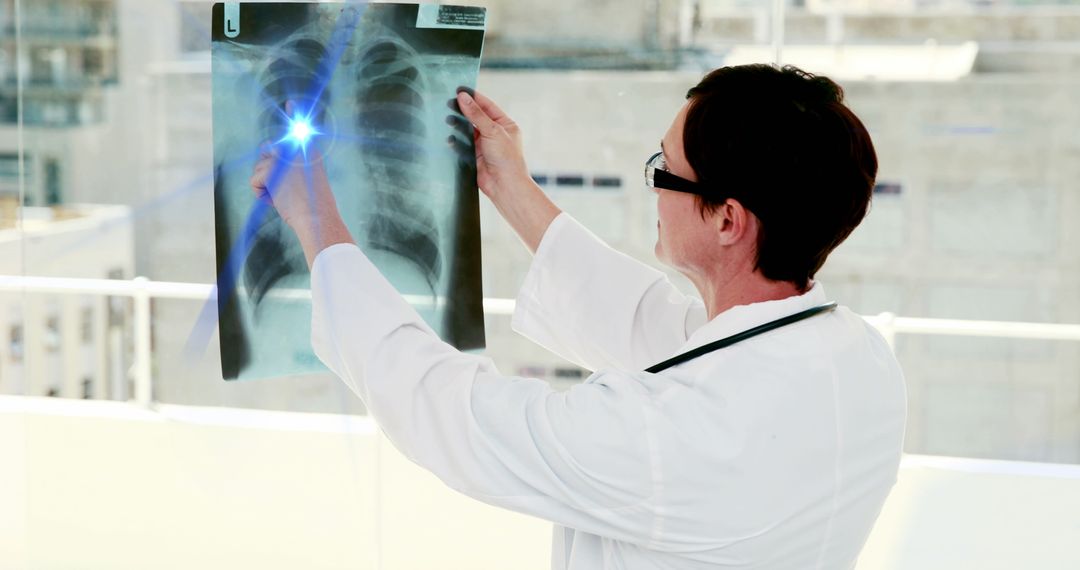 Doctor Analyzing Chest X-ray in Sunlit Room