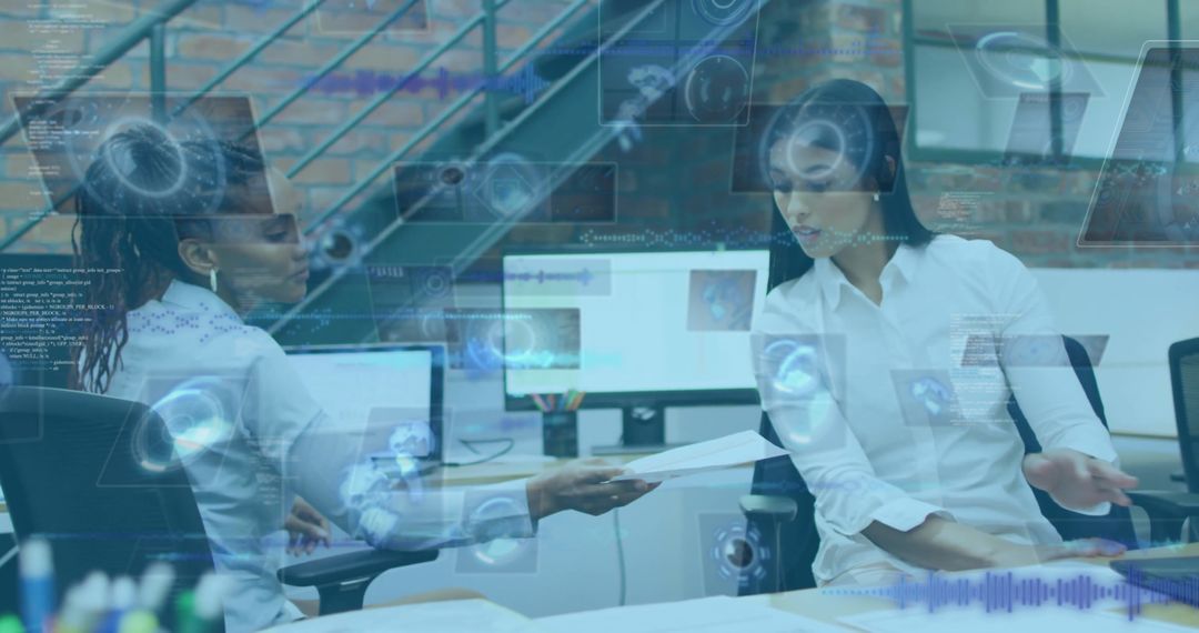 Women Colleagues Collaborating in High-Tech Office with Digital Overlays