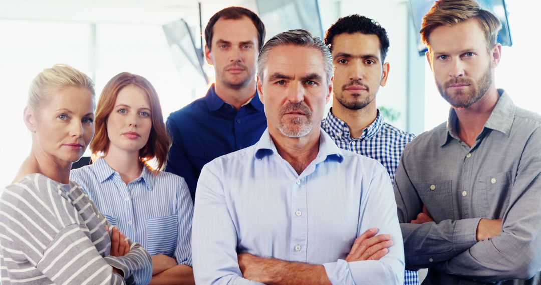 Confident Business Team Demonstrating Determination and Unity