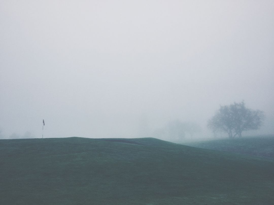Misty Morning on Golf Course with Flagstick Slightly Visible - Free Images, Stock Photos and Pictures on Pikwizard.com