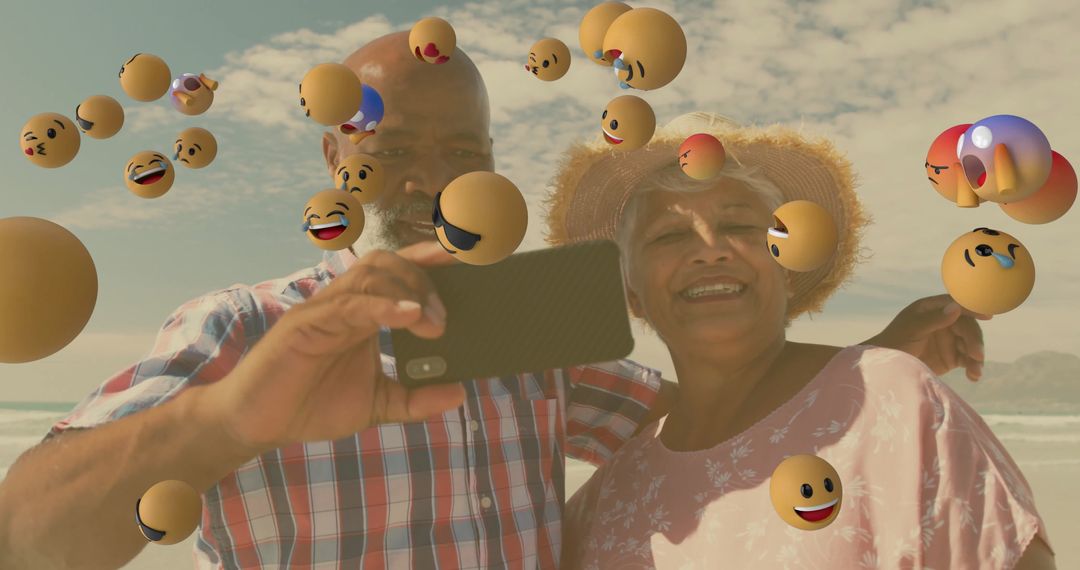 Smiling Couple Taking Selfie With Playful Emojis on Sunny Beach