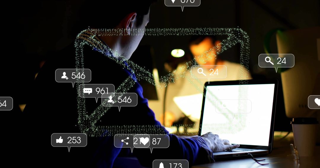 Man Using Laptop in Dim Room with Social Media Notifications