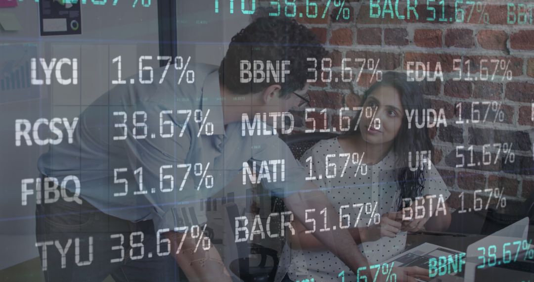 Office Team Analyzing Stock Market Data on Screens